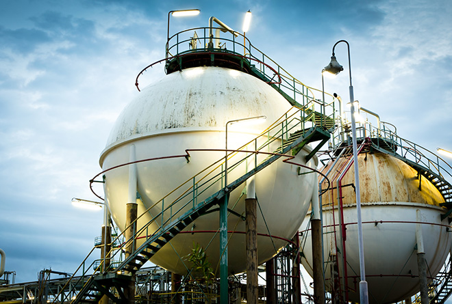 Industries - Process Visualization a large white tank with a staircase leading to it